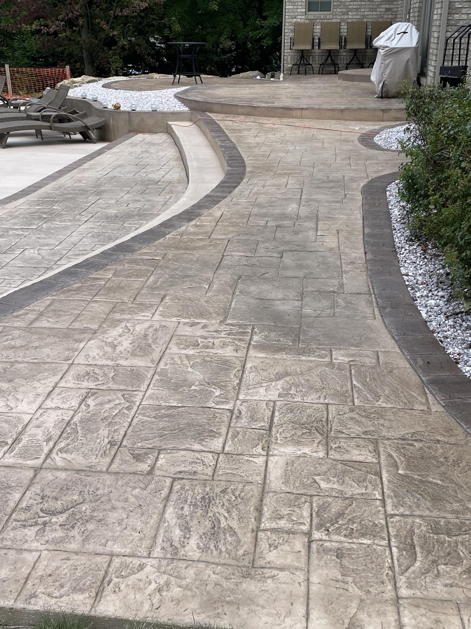 Read more about the article No Pool is Complete without a Stamped Concrete Walkway